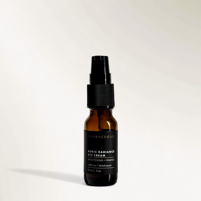 Brown bottle with black cap on a white background