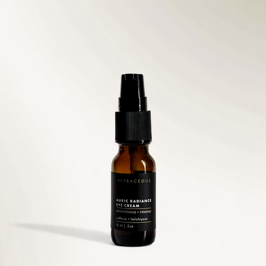 Brown bottle with black cap on a white background