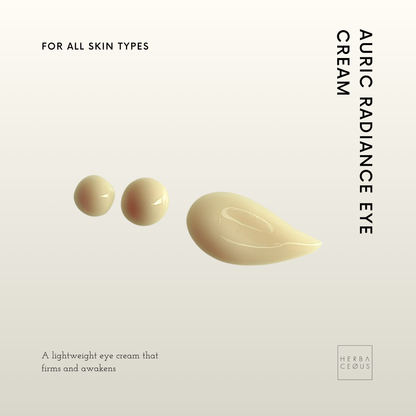 Auric Radiance Eye Cream packaging with cream application on a beige background